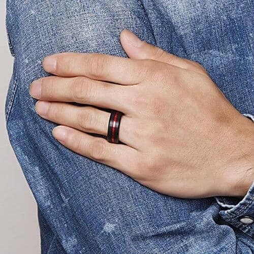 Man wearing his black and red ring