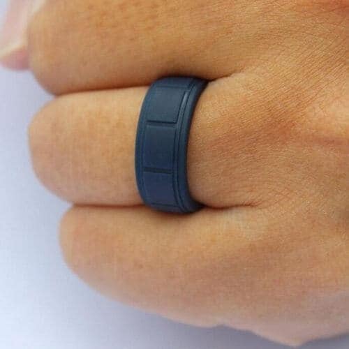 Man wears navy blue silicone ring