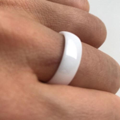 Man wearing white ceramic ring